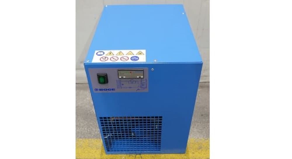 Blue BOGE refrigerant dryer with control panel, safety labels, and ventilation grille, positioned on a concrete floor.
