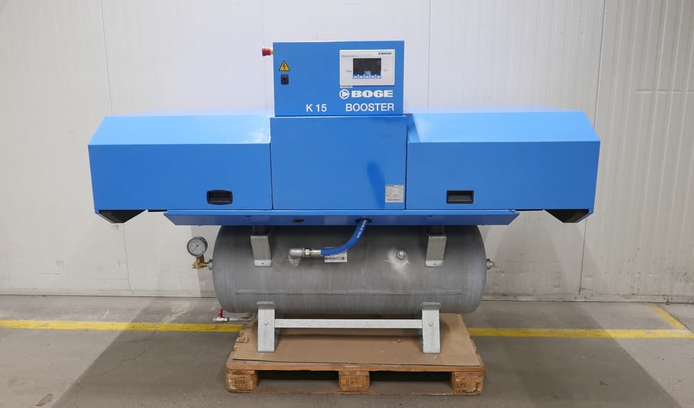 BOGE K15 Booster air compressor in blue, mounted on a receiver, displayed indoors on a pallet.