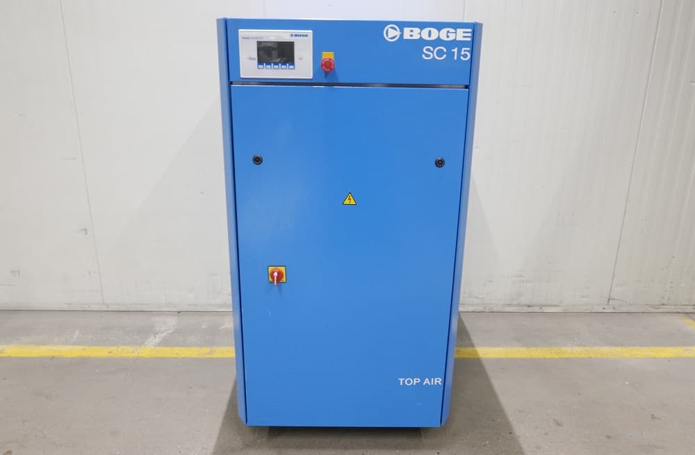 Blue BOGE SC 15 air compressor with control panel, standing in an industrial setting.