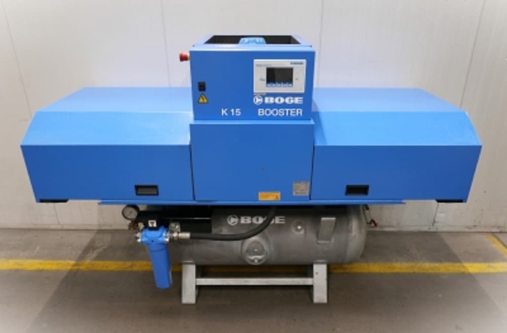 BOGE K 15 Booster air compressor in a blue casing, designed for efficient compressed air solutions, displayed in an industrial setting.