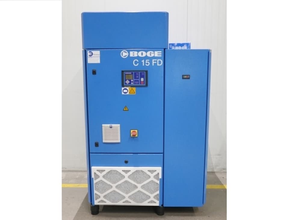 BOGE C 15 FD air compressor in blue, featuring a control panel and safety labels, designed for efficient and reliable compressed air solutions.