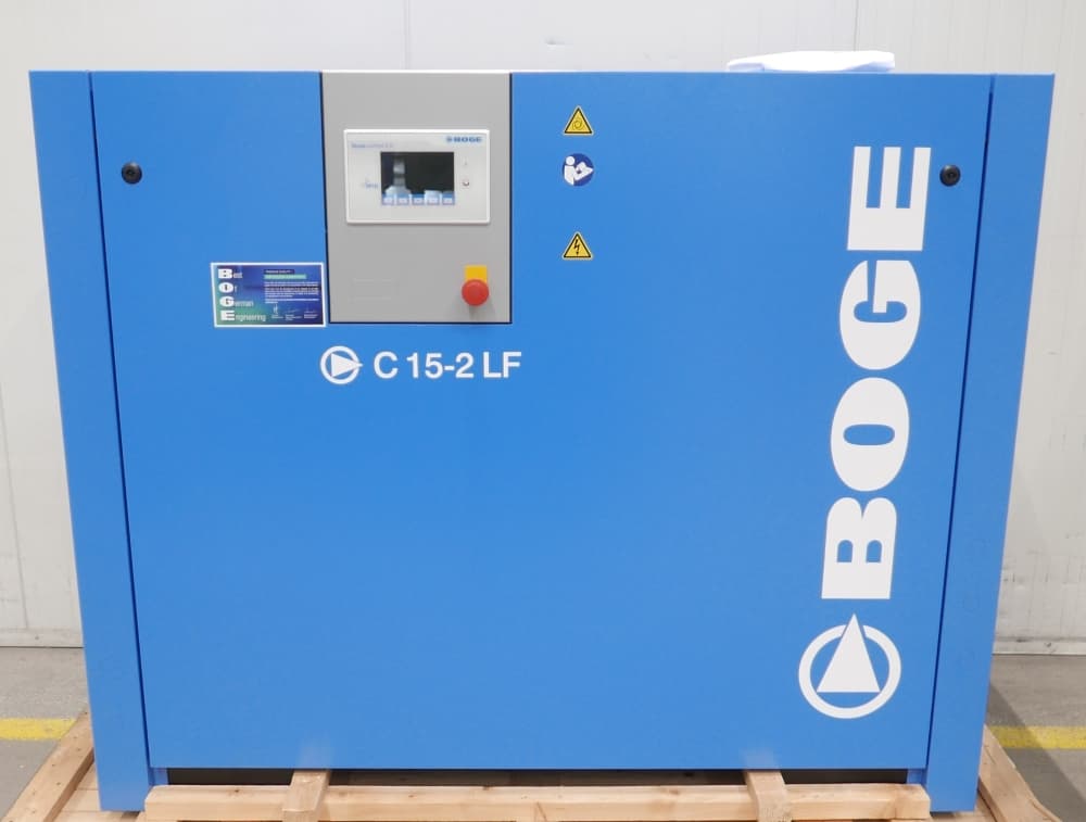 BOGE C 15-2 LF air compressor in blue, featuring control panel and safety icons, on a wooden pallet.