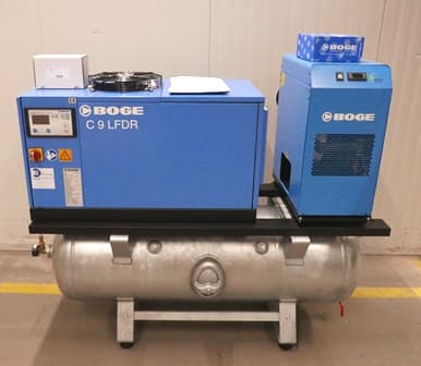 BOGE C 9 LFDR air compressor system with blue casing, mounted on a silver receiver, in an industrial setting.