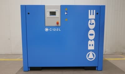 BOGE C 12-2 L air compressor in blue, featuring a control panel and BOGE branding, set against a neutral indoor background.