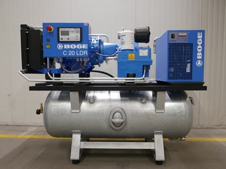 BOGE C 20 LDR air compressor system with blue components mounted on a silver receiver, set against an industrial background.