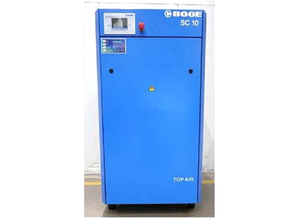 Blue BOGE SC 10 air compressor with control panel and safety warning, designed for efficient compressed air solutions.