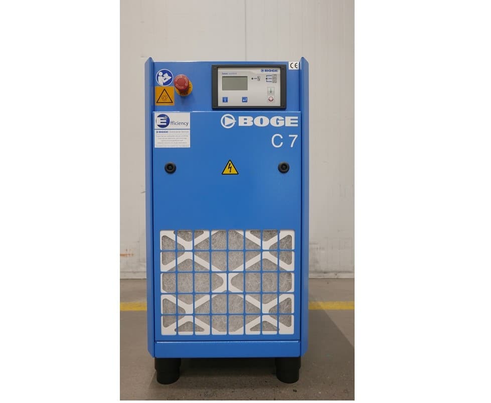 BOGE C7 air compressor in blue, featuring a digital control panel and safety labels, designed for efficient compressed air solutions.